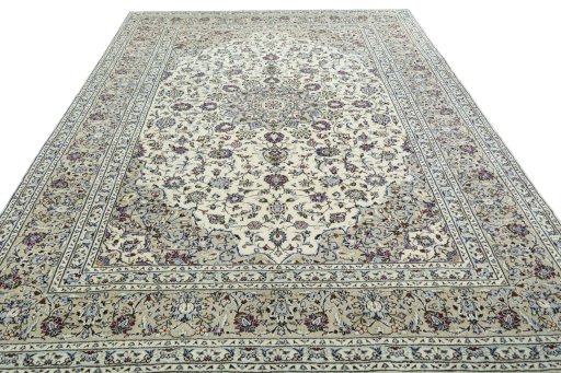 Surface texture of 2000s Kashan rug with natural Wool and intricate pattern