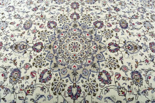 Central medallion detail of 2000s Kashan rug from Iran / Persia