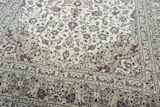 Close-up detail of 2000s Kashan rug from Iran / Persia showing Wool weave