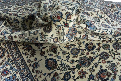 Surface texture of 2000s Kashan rug with natural Wool and intricate pattern