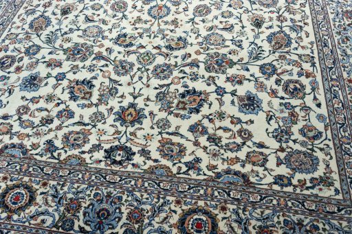 Close-up detail of 2000s Kashan rug from Iran / Persia showing Wool weave
