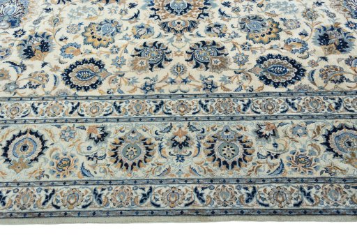 Corner detail of 1970s Kashan rug showing border pattern and Cork pile