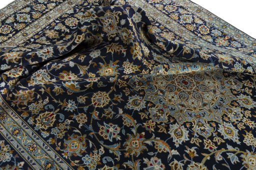 Surface texture of 2000s Kashan rug with natural Wool and intricate pattern