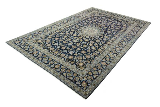 Corner detail of 2000s Kashan rug showing border pattern and Wool pile