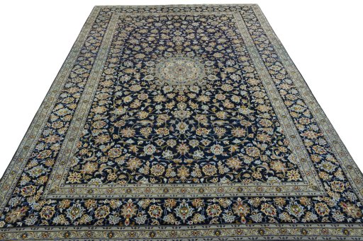 Surface texture of 2000s Kashan rug with natural Wool and intricate pattern