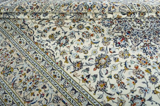 Close-up detail of 2000s Kashan rug from Iran / Persia showing Wool weave