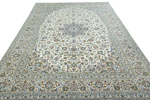 Surface texture of 2000s Kashan rug with natural Wool and intricate pattern