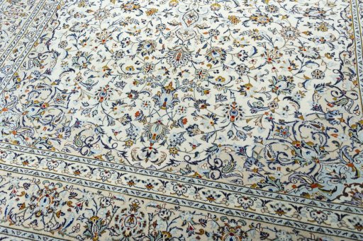 Close-up detail of 2000s Kashan rug from Iran / Persia showing Wool weave