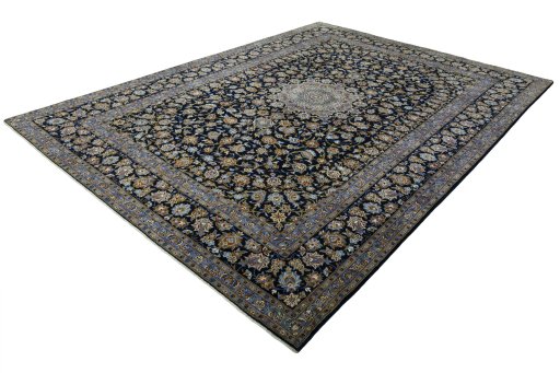 Corner detail of 2000s Kashan rug showing border pattern and Wool pile