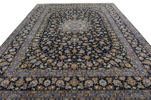 Surface texture of 2000s Kashan rug with natural Wool and intricate pattern