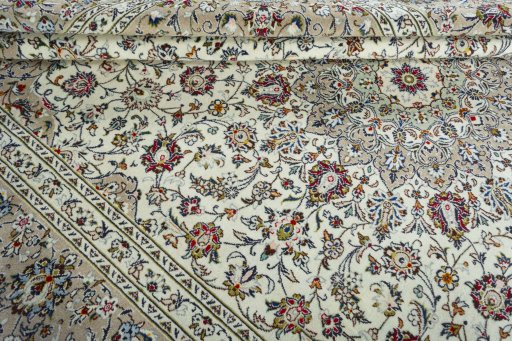 Close-up detail of 2000s Kashan rug from Iran / Persia showing Wool weave