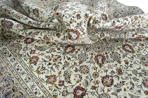 Surface texture of 2000s Kashan rug with natural Wool and intricate pattern