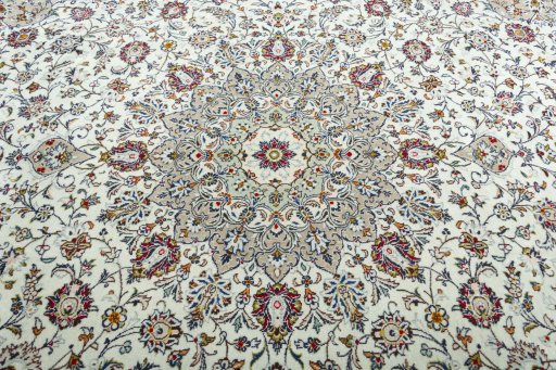 Central medallion detail of 2000s Kashan rug from Iran / Persia