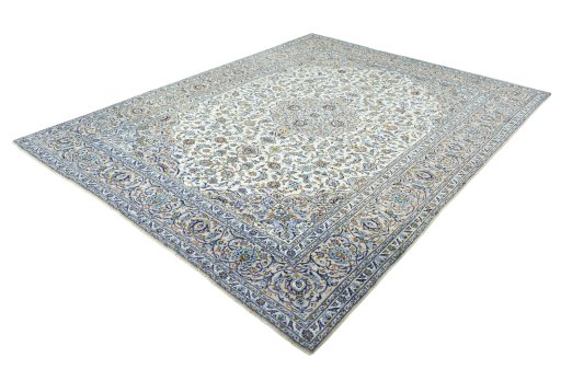 Corner detail of 2000s Kashan rug showing border pattern and Wool pile