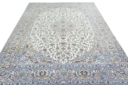 Surface texture of 2000s Kashan rug with natural Wool and intricate pattern