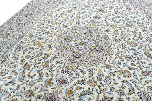 Backside of handmade 2000s Kashan rug showing knot structure and weave density