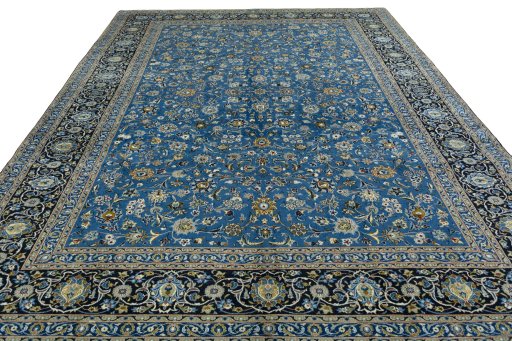 Surface texture of 2000s Kashan rug with natural Wool and intricate pattern