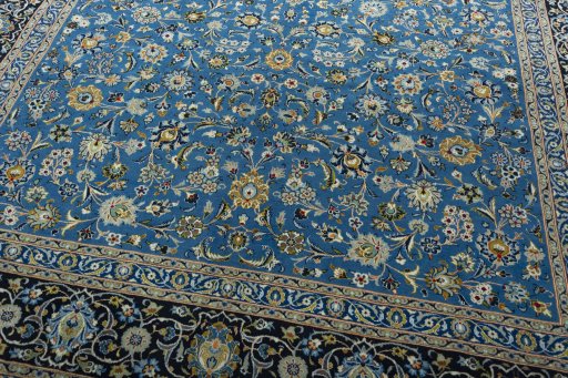 Close-up detail of 2000s Kashan rug from Iran / Persia showing Wool weave
