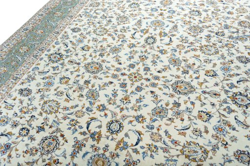 Backside of handmade 2000s Kashan rug showing knot structure and weave density