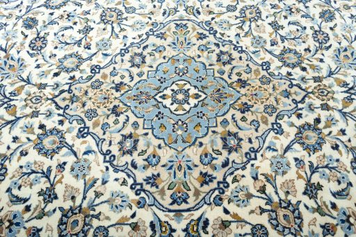 Central medallion detail of 2000s Kashan rug from Iran / Persia