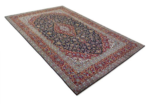 Surface texture of 2000s Kashan rug with natural Wool and intricate pattern
