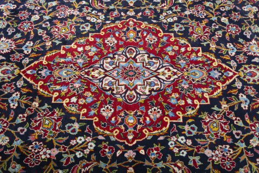 Close-up detail of 2000s Kashan rug from Iran / Persia showing Wool weave