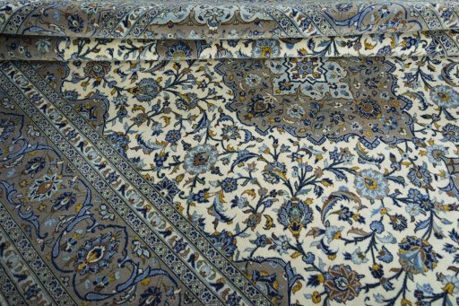 Close-up detail of 2000s Kashan rug from Iran / Persia showing Cork weave