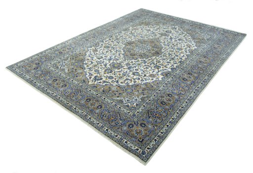 Corner detail of 2000s Kashan rug showing border pattern and Cork pile