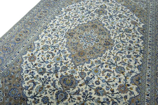 Backside of handmade 2000s Kashan rug showing knot structure and weave density