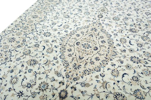Backside of handmade 2000s Kashan rug showing knot structure and weave density