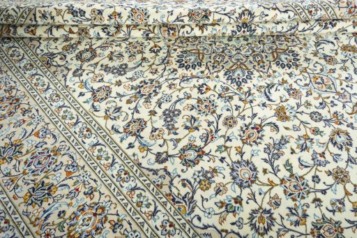Close-up detail of 2000s Kashan rug from Iran / Persia showing Wool weave