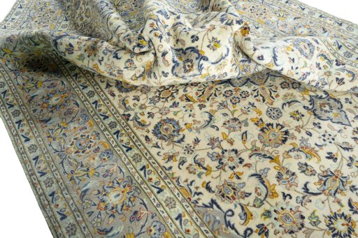 Surface texture of 2000s Kashan rug with natural Wool and intricate pattern