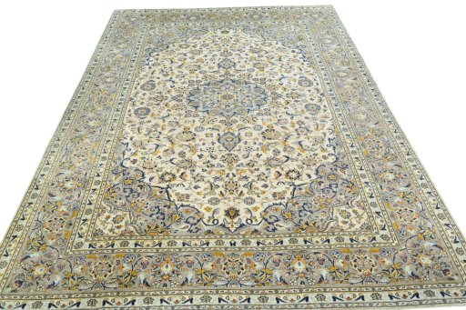 Surface texture of 2000s Kashan rug with natural Wool and intricate pattern