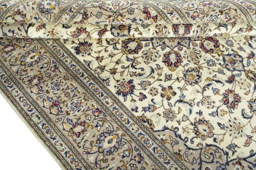 Close-up detail of 2000s Kashan rug from Iran / Persia showing Wool weave