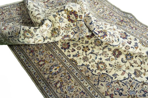 Surface texture of 2000s Kashan rug with natural Wool and intricate pattern