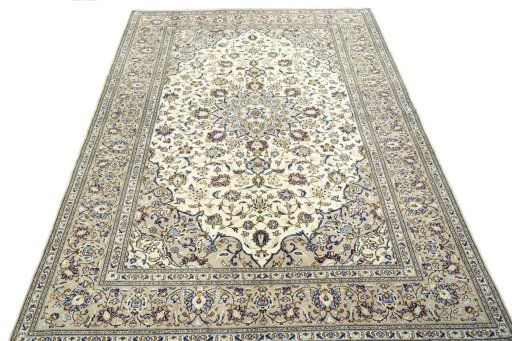 Surface texture of 2000s Kashan rug with natural Wool and intricate pattern