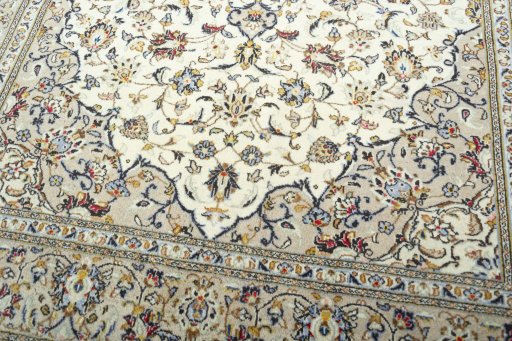 Close-up detail of 2000s Kashan rug from Iran / Persia showing Wool weave