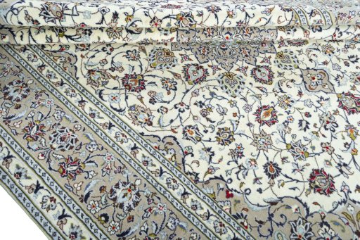 Close-up detail of 2000s Kashan rug from Iran / Persia showing Wool weave