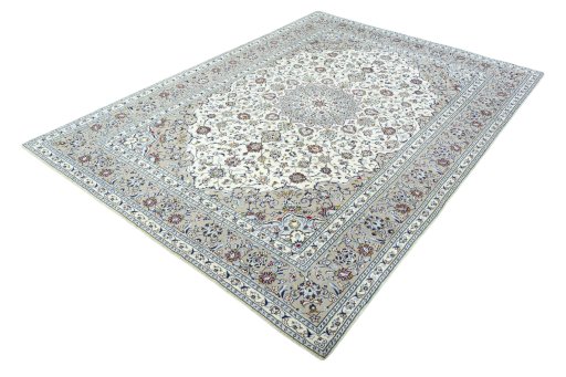 Corner detail of 2000s Kashan rug showing border pattern and Wool pile