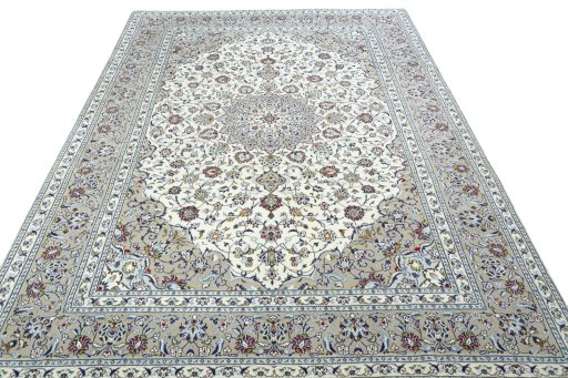 Surface texture of 2000s Kashan rug with natural Wool and intricate pattern