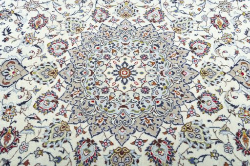 Central medallion detail of 2000s Kashan rug from Iran / Persia