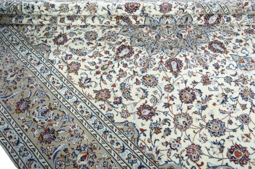 Close-up detail of 2000s Kashan rug from Iran / Persia showing Wool weave