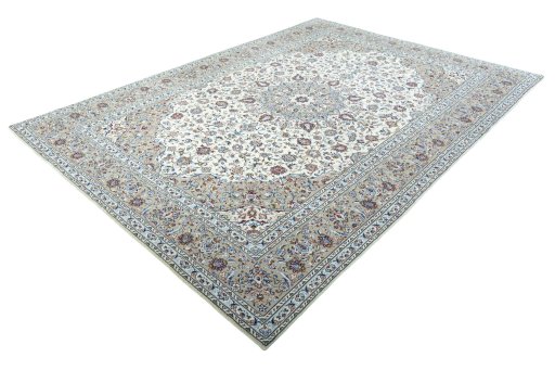 Corner detail of 2000s Kashan rug showing border pattern and Wool pile