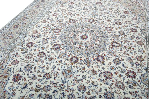 Backside of handmade 2000s Kashan rug showing knot structure and weave density
