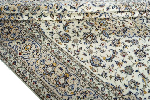 Close-up detail of 2000s Kashan rug from Iran / Persia showing Wool weave