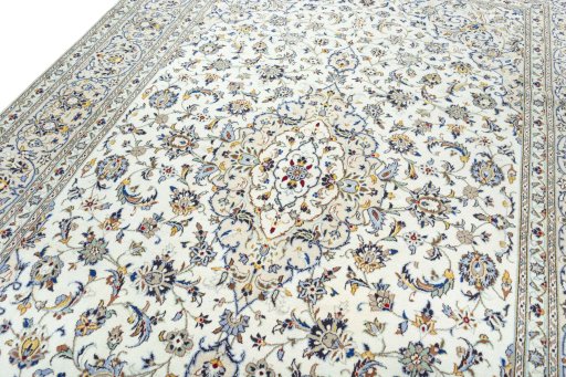 Backside of handmade 2000s Kashan rug showing knot structure and weave density
