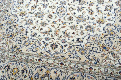 Close-up detail of 2000s Kashan rug from Iran / Persia showing Wool weave