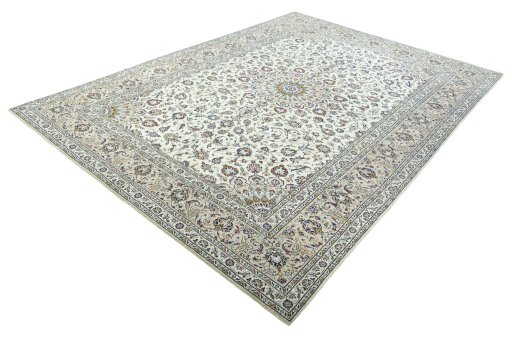 Corner detail of 2000s Kashan rug showing border pattern and Wool pile