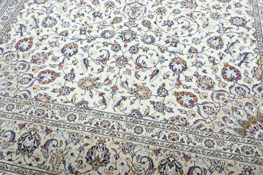 Close-up detail of 2000s Kashan rug from Iran / Persia showing Wool weave