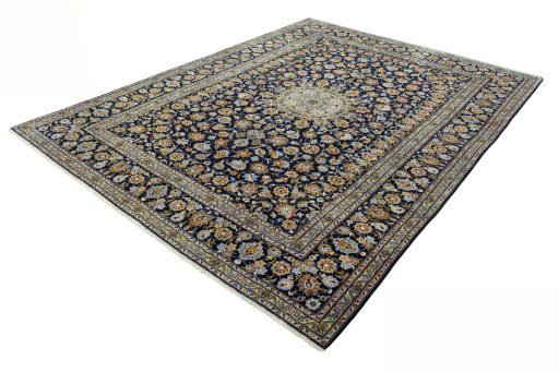 Corner detail of 2000s Kashan rug showing border pattern and Wool pile